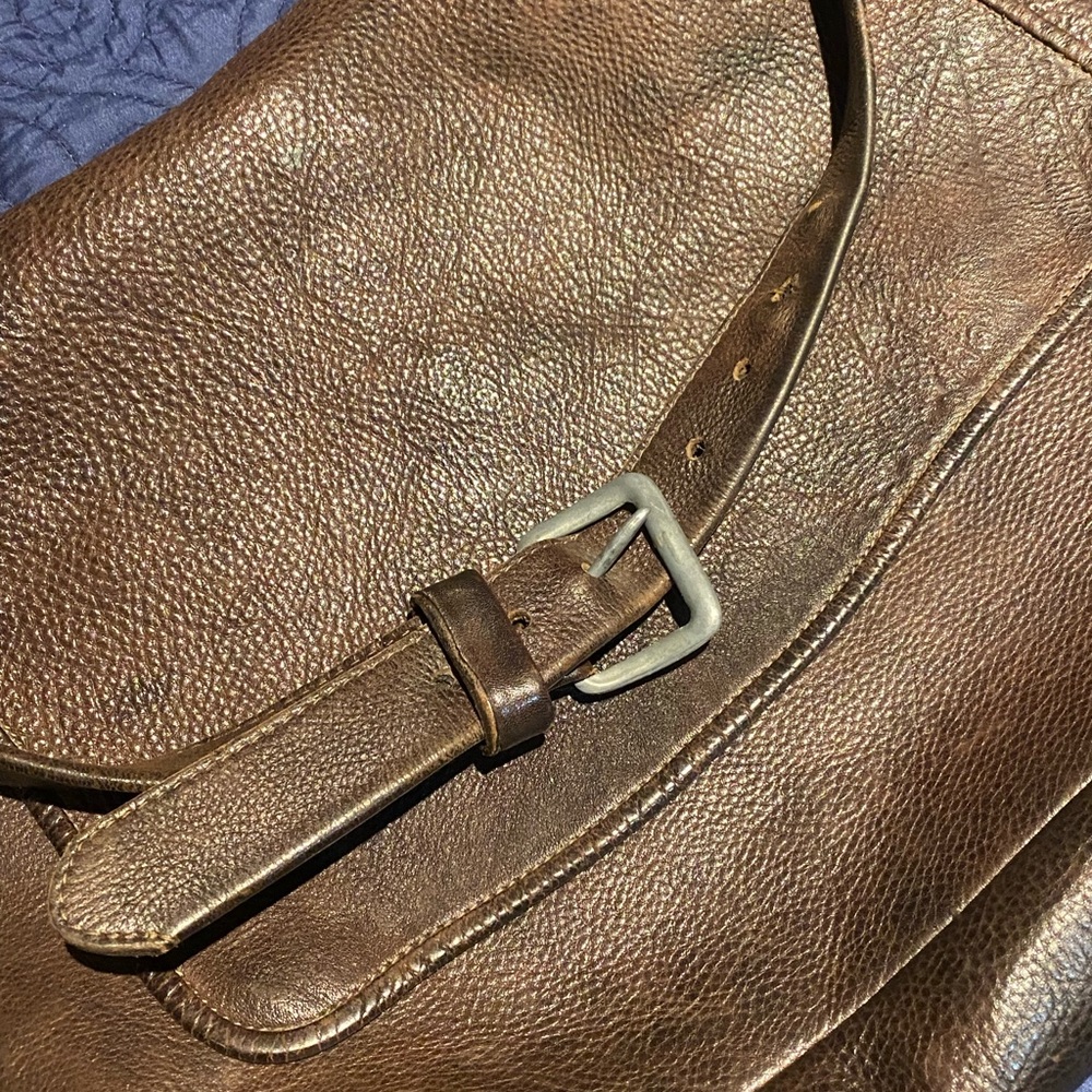 Leather messenger bag by Rugby in Canada